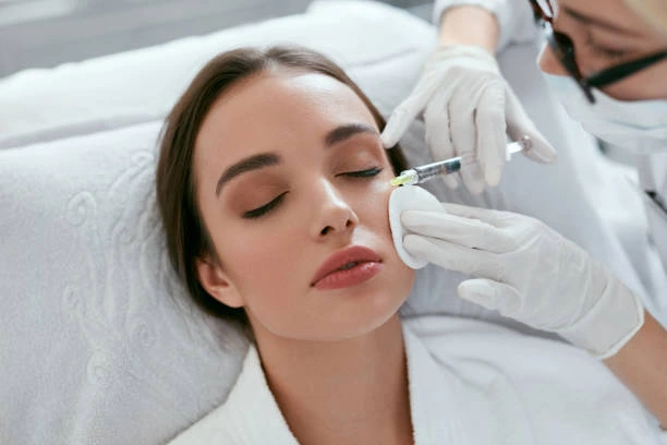 women getting Under Eye Fillers treatment