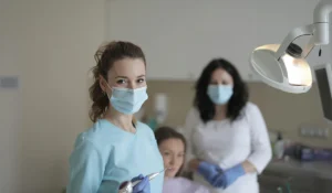 Hygienist and a Dentist standing togather